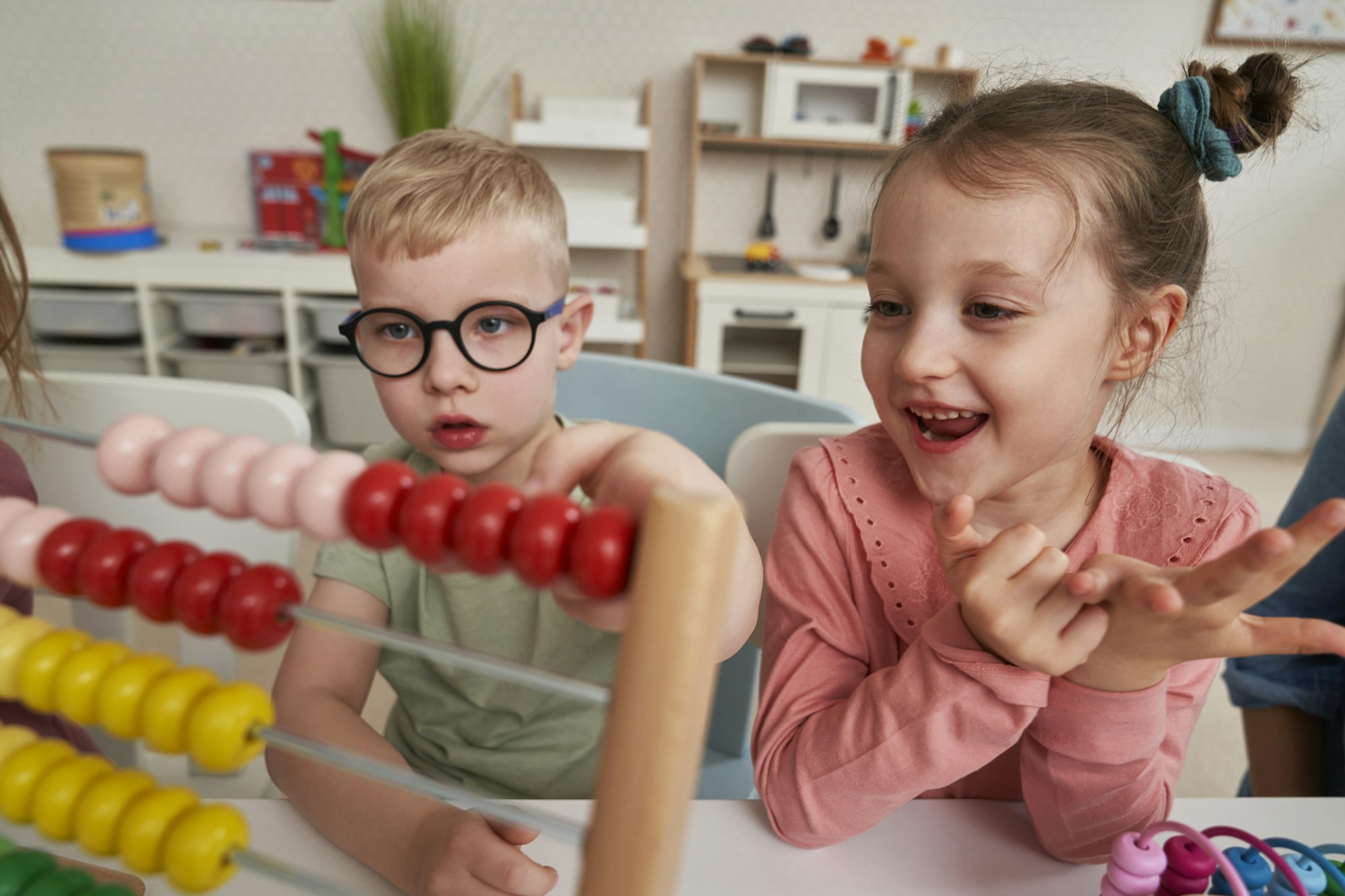 Preschool children using abacus to learn